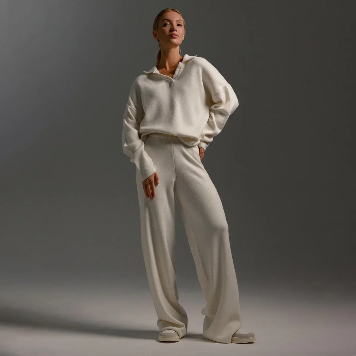 Women's knit tracksuit with polo-neck knit sweater and wide-leg trousers