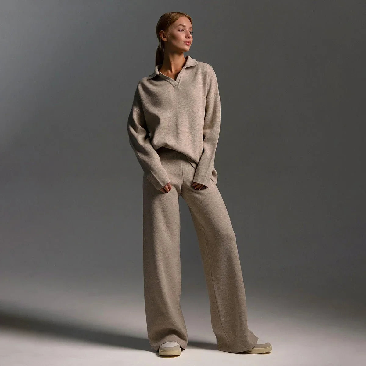 Women's knit tracksuit with polo-neck knit sweater and wide-leg trousers